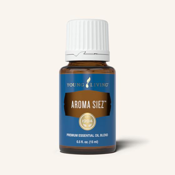 Aroma Siez™ etherische olieblend van Young Living met een warm, kruidig en verfrissend aroma, ideaal voor aromatherapie en ontspannende massages.