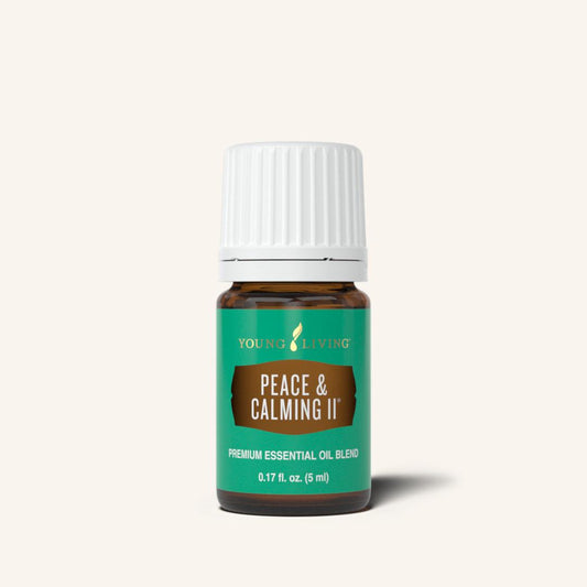 Peace & Calming II® etherische olieblend van Young Living met Tangerine, Orange, Patchouli, Blue Tansy en Ylang Ylang voor aromatherapie en dagelijks gebruik.