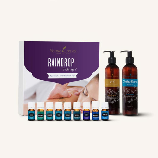 Young Living Raindrop Technique® Collection met negen etherische oliën, twee massageoliën en een officiële instructiebrochure.