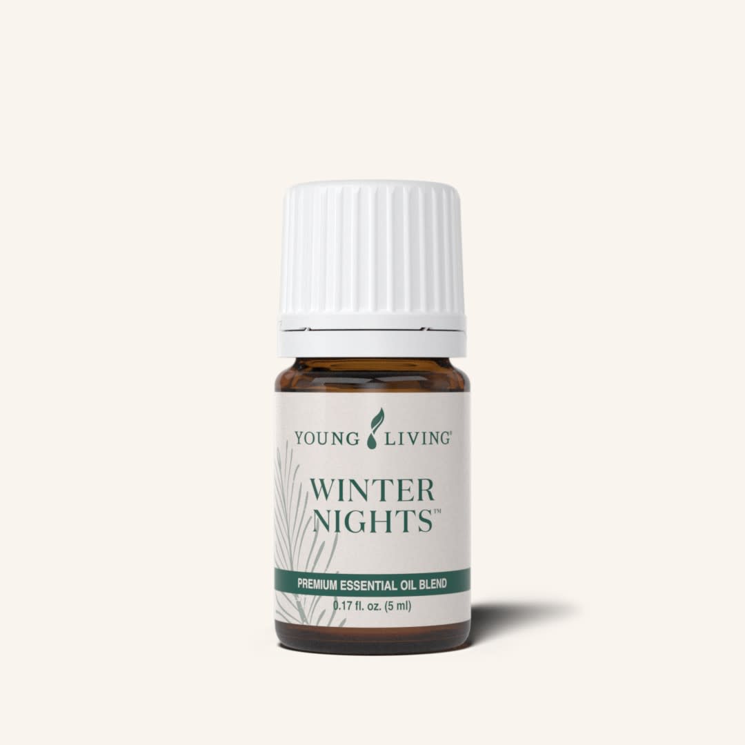 Young Living Winter Nights™ etherische olieblend met Northern Lights Black Spruce, Idaho Grand Fir, Cedarwood, Kaneel, Kruidnagel, Sinaasappel en Pepermunt voor aromatherapie.